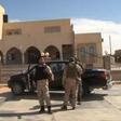 A still image from video released May 17, 2016 shows forces loyal to Libyan unity government outside the National Commercial bank after the recapture of Abu Grain, one of the main checkpoints south of the city of Misrata, Libya from Islamic State.