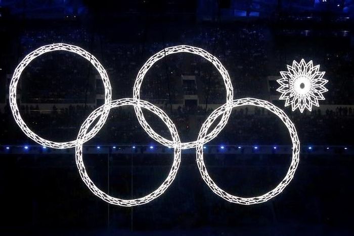 Four of five Olympic Rings are seen lit up during the opening ceremony of the 2014 Sochi Winter Olympics, February 7, 2014.