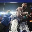 Floyd Mayweather (black trunks) talks with the crowd during his WBA/WBC welterweight title bout against Andre Berto (white trunks) at MGM Grand Garden Arena. Mayweather won via unanimous decision. Sep 12, 2015; Las Vegas, NV, USA;