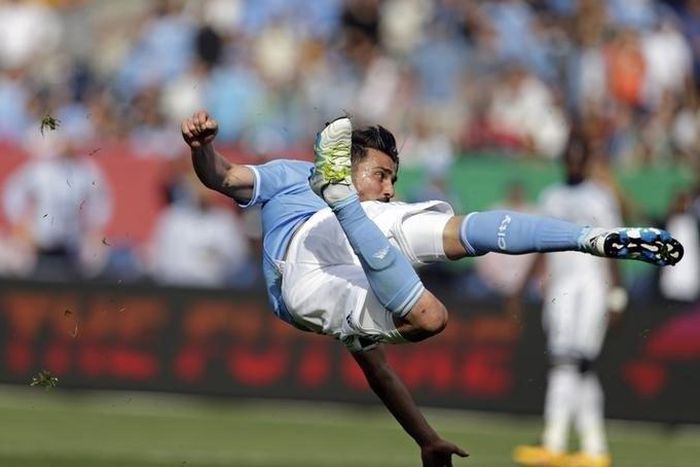 New York City FC forward David Villa (7) watches his second goal during the first half against the Vancouver Whitecaps at Yankee Stadium.