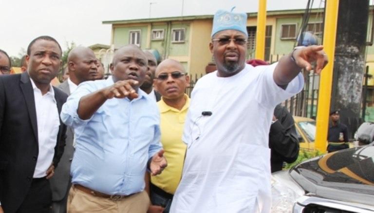 Gov. Akinwunmi Ambode inspecting some projects alongside Folarin Folorunsho Coker