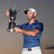 Johnson wins first major title amid rules controversy