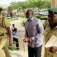 Olisa Metuh appears in an Abuja court in handcuffs on January 25, 2016