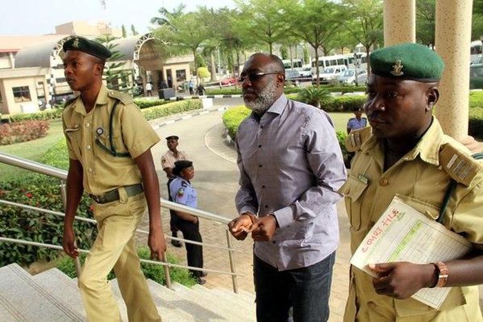 Olisa Metuh appears in an Abuja court in handcuffs on January 25, 2016