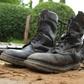 Military boots are displayed after they were recovered from suspected fighters following clashes in the capital Bujumbura, Burundi December 12, 2015. REUTERS/Jean Pierre Aime Harerimana