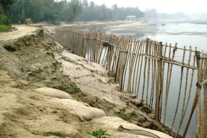 Bangladesh river eats up land and homes, trapping poor villagers