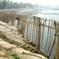 Bangladesh river eats up land and homes, trapping poor villagers