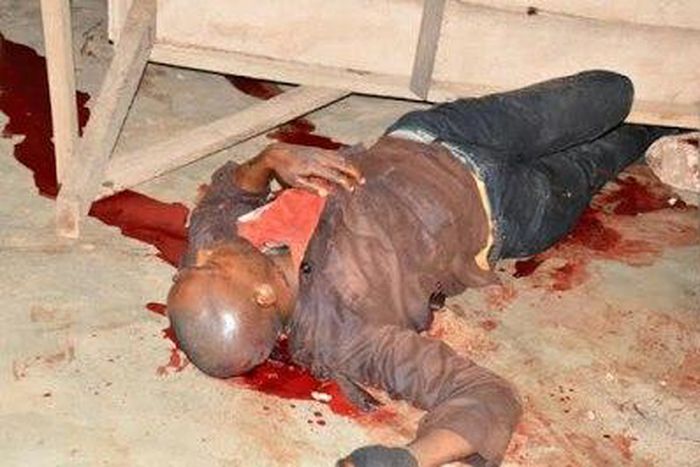 The body of one of the vigilante group members