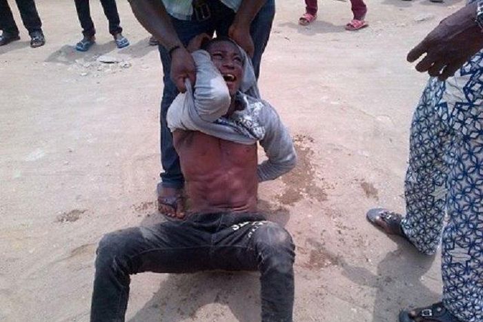 The thief being given the gutter justice