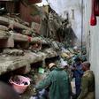 Rescue workers search for residents feared trapped in the rubble of a six-storey building that collapsed after days of heavy rain, in Nairobi, Kenya April 30, 2016.   REUTERS/Harman Kariuki