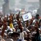Police fire tear gas at anti-government protesters