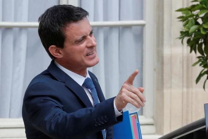 French PM urges hardline union to halt anti-reform rallies in Paris