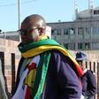 Zimbabwean Pastor Evan Mawarire , who organized a 'stay at home' anti-government protest last week, arrives at the Harare Central Police station in Zimbabwe, July 12, 2016.