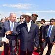 Israeli Prime Minister Benjamin Netanyahu (C) introduces members of his delegation to Uganda's President Yoweri Museveni after arriving to commemorate the 40th anniversary of Operation Entebbe at the Entebbe airport in Uganda, July 4, 2016.