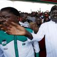 Leaders of Kenya's opposition Coalition for Reforms and Democracy (CORD), Raila Odinga (R) and Moses Wetangula (L) arrive at a rally to mark Kenya's Madaraka Day, the 53rd anniversary of the country's self rule, at Uhuru Park grounds in Nairobi, Kenya,...