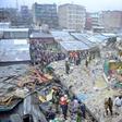Rescue workers search for residents feared trapped in the rubble of a six-storey building that collapsed after days of heavy rain, in Nairobi, Kenya April 30, 2016.  REUTERS/John Muchucha