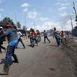 A supporter of Kenya's opposition Coalition for Reforms and Democracy (CORD) uses a sling to hurl stones towards their opponents during a protest against at the Independent Electoral and Boundaries Commission (IEBC) to demand the disbandment of the ele...