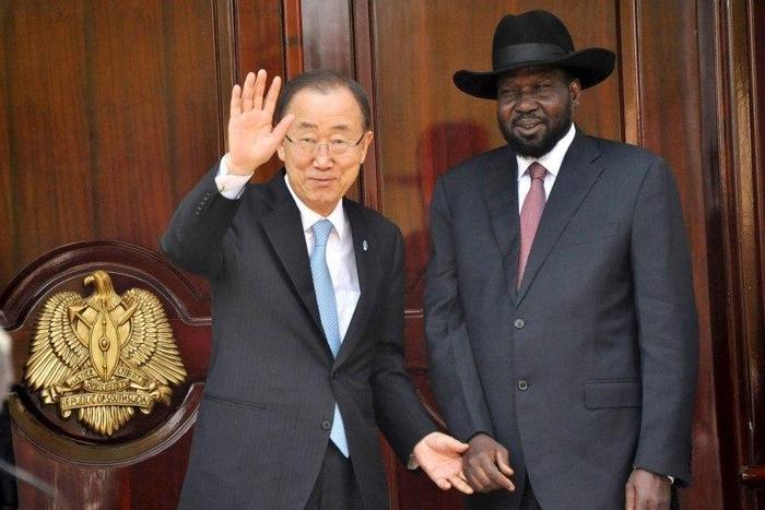 United Nations Secretary-General Ban Ki-moon waves next to South Sudan's President Salva Kiir in the capital Juba February 25, 2016. REUTERS/Jok Solomon
