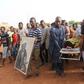 Men carry the body of late photographer Malick Sidibe during an official ceremony commemorating him in Bamako, Mali, April 16, 2016.  REUTERS/Joe Penney
