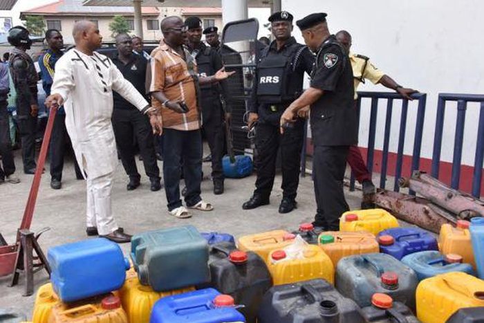 The Commander of the Rapid Response Squad (RRS), ACP. Tunji Disu  as well as the Divisional Police Officer, Isheri Police Station, Superintendent Olohunwa Ogundele, arresting a petrol station manager