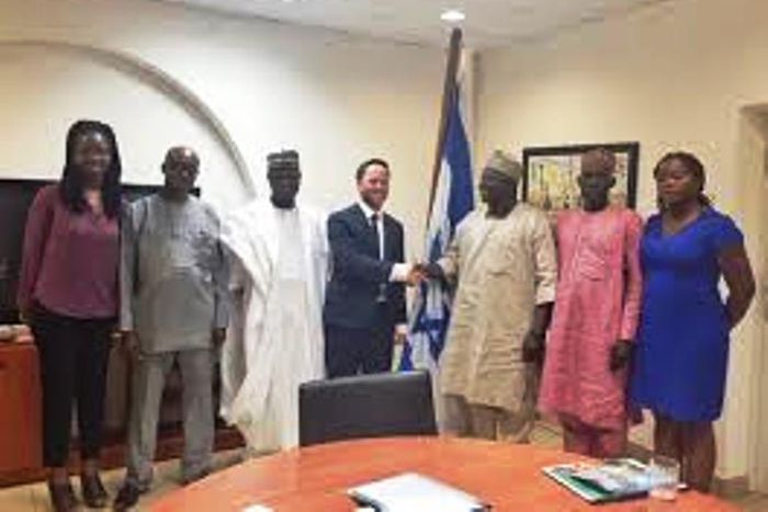 Nadav Goren discussing collaboration with leaders of the United Methodist Church of Nigeria