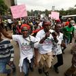 Kenyan opposition Coalition for Reforms and Democracy (CORD), supporters protest at the premises hosting the headquarters of Independent Electoral and Boundaries Commission (IEBC) to demand the disbandment of the electoral body ahead of next year's ele...
