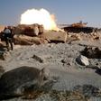 A fighter of Libyan forces allied with the U.N.-backed government fires a shell with Soviet made T-55 tank at Islamic State fighters from a beach in Sirte, Libya, August 3, 2016.