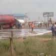Nigerians spotted scooping petrol after tanker falls, spilling content