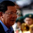 Cambodia PM shrugs off EU aid threat, opposition supporters jailed