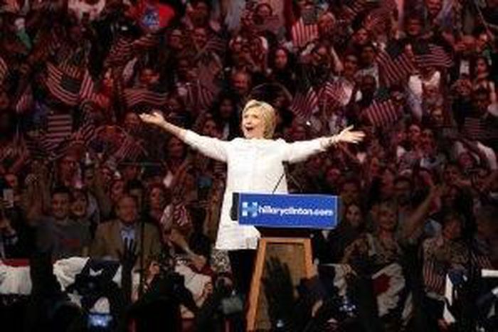 Declaring a historic victory, Clinton turns fire on Trump in her White House bid