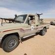 A Libyan soldier sits in a military vehicle at checkpoint in Wadi Bey, west of the Islamic State-held city of Sirte, February 23, 2016.