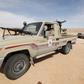 A Libyan soldier sits in a military vehicle at checkpoint in Wadi Bey, west of the Islamic State-held city of Sirte, February 23, 2016.