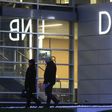 People leave DNB bank's local office in Riga November 20, 2013.    REUTERS/Ints Kalnins