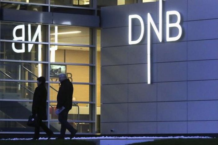 People leave DNB bank's local office in Riga November 20, 2013.    REUTERS/Ints Kalnins