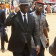 Ivory Coast's President Alassane Ouattara arrives to attend a ceremony in tribute to the victims of the Grand Bassam shooting, at a stadium in Grand Bassam, Ivory Coast, March 20, 2016. REUTERS/Thierry Gouegnon