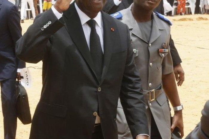 Ivory Coast's President Alassane Ouattara arrives to attend a ceremony in tribute to the victims of the Grand Bassam shooting, at a stadium in Grand Bassam, Ivory Coast, March 20, 2016. REUTERS/Thierry Gouegnon
