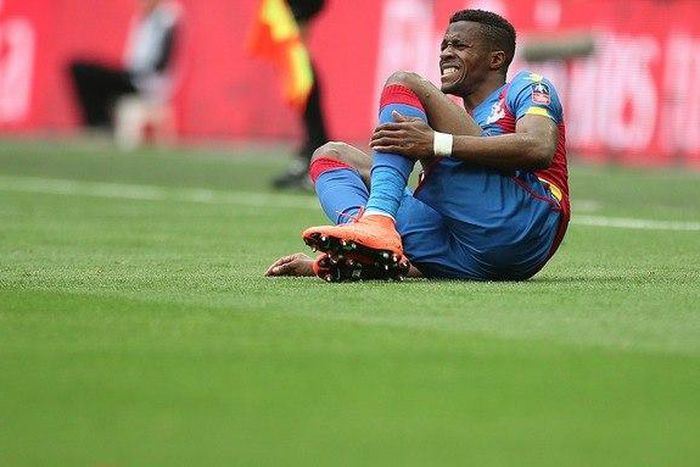 Injured Palace winger Zaha a doubt for FA Cup final