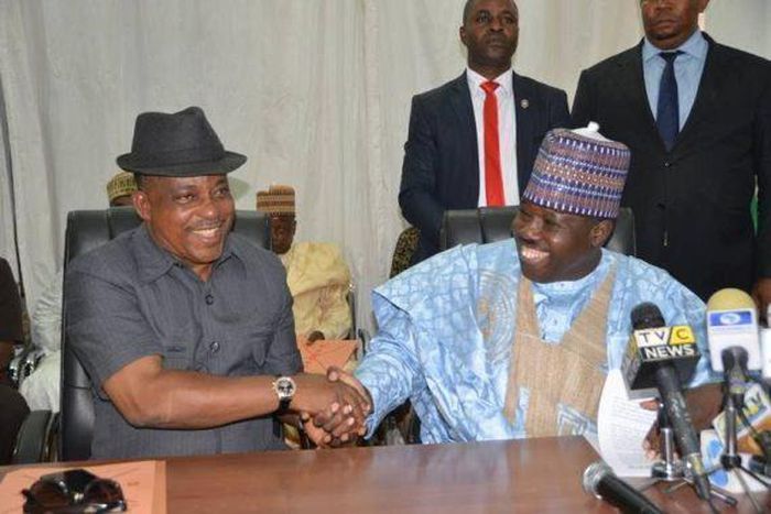 Former PDP Acting Chairman, Uche Secondus hands over to the party’s new chairman, Ali Modu Sheriff on February 22, 2016, at the party's secretariat in Abuja.