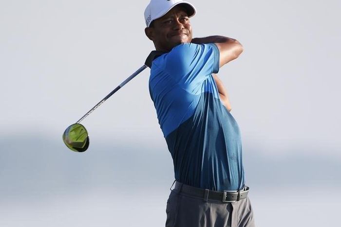 Tiger Woods hits his tee shot on the 16th hole during the continuation of the second round of the 2015 PGA Championship golf tournament at Whistling Straits.