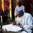 President Muhammadu Buhari signs condolence register for late Minister of State for Labour and Productivity, James Ocholi on March 9, 2016