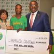 L-R: Hon. Suraju Adekunbi, Speaker, Ogun State House of Assembly; Mrs. Gladys Talabi, Executive Director, Legal Services, Globacom; Hamed Olatunde, N5 Million Winner, and Mr  Waheed Olagunju, Acting Managing Director, Bank of Industry, at the formal pr...