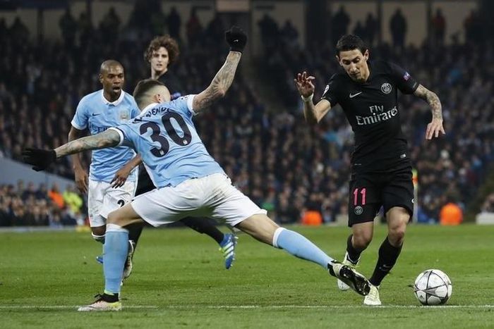 PSG's Angel Di Maria in action with Manchester City's Nicolas Otamendi. Football Soccer - Manchester City v Paris St Germain - UEFA Champions League Quarter Final Second Leg - Etihad Stadium, Manchester, England - 12/4/16 Action Images via