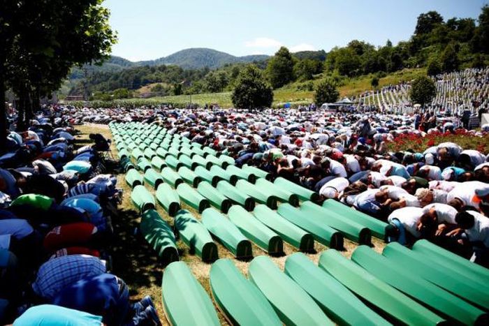 Srebrenica buries 127 victims of massacre, Serbs absent over genocide denial