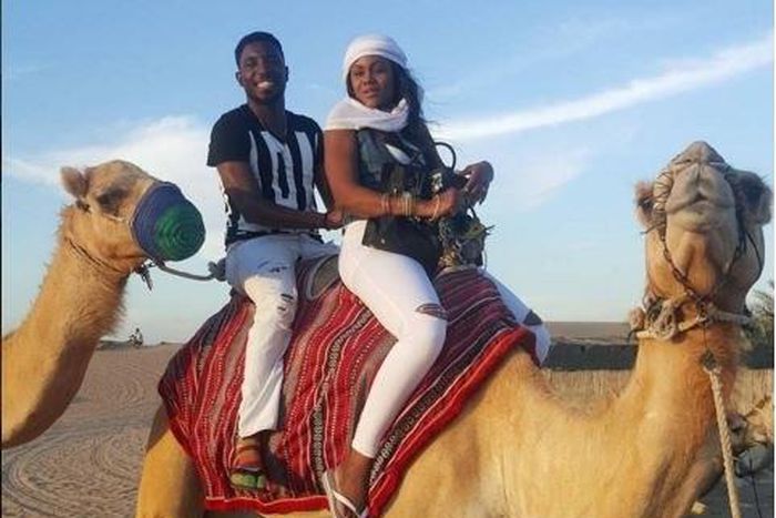 Timi Dakolo and wife Busola Dakolo atop a Camel