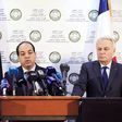 A member of the Presidential Council of Government of National Accord, Ahmed Maiteeq (C) stands next to German Foreign Minister Frank-Walter Steinmeier (L) and French Foreign Minister Jean-Marc Ayrault (R) dueing a joint news conference in Tripoli, Lib...