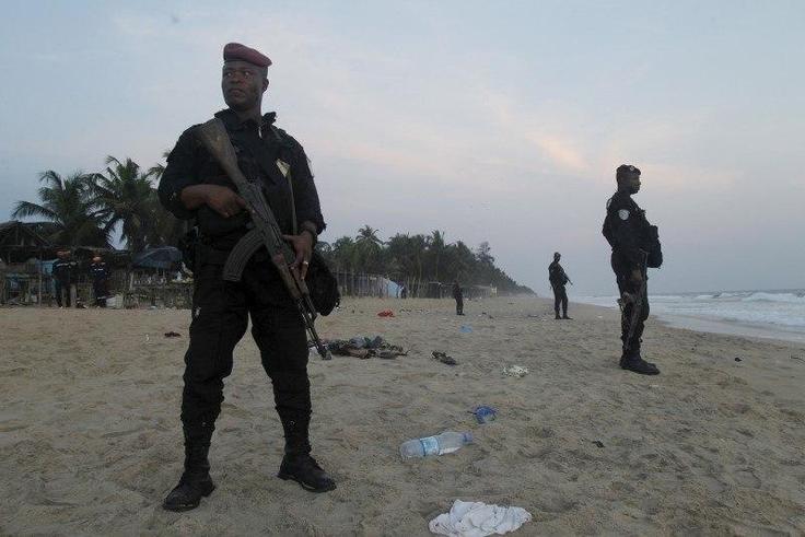 Soldiers stand in guard on the beach in Grand Bassam, Ivory Coast, March 13, 2016. REUTERS/Luc Gnago