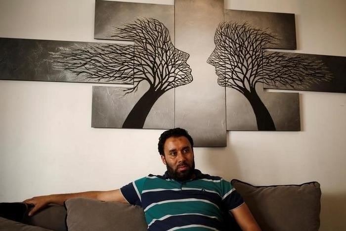 Sofiane Melliti, 38, a Tunisian soccer player who says he has been harassed by authorities because of suspected ties to militant attacks, poses for a photograph in Tunis, Tunisia, April 15, 2016. To match Insight TUNISIA-DEMOCRACY/