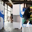 A women wearing ANC regalia casts her vote during the local government elections in Hillbrow, central Johannesburg, South Africa August 3,2016.