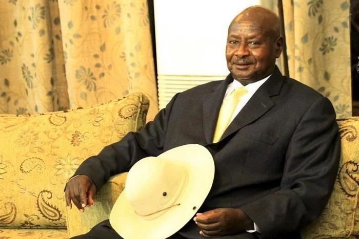Uganda's President Yoweri Museveni smiles at Khartoum Airport during an official visit to Sudan September 15, 2015.