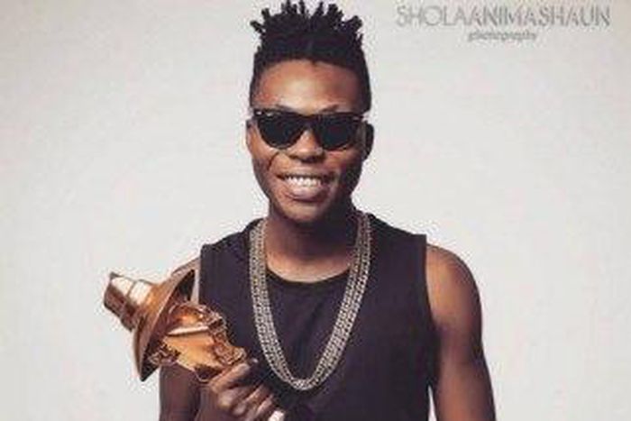 Reekado Banks with his Next Rated award at The Headies 2015.